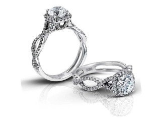 14-karat white gold engagement ring with one-carat centre and white diamonds (.39 ctw).