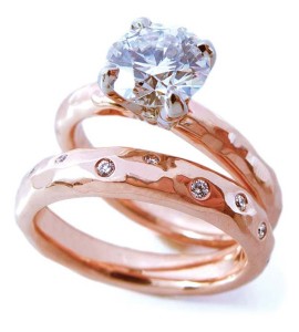 Hand-hammered 14-karat rose gold engagement ring by Shelly Purdy, featuring a 1.50-carat Canadian diamond. Matching wedding band set with 19 diamonds (.45 ctw).