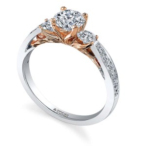 18-karat gold engagement ring by Corona Jewellery Co., set with a .80-carat round brilliant Canadian centre diamond.