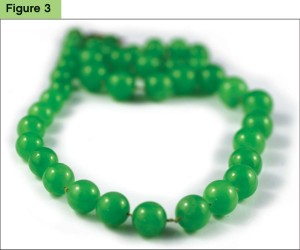 This necklace was presented as jadeite jade by a client at our offices. Testing revealed it to be dyed quartzite.