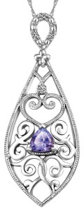 White gold pendant  by Beverly Hills Jewellers  with diamonds and tanzanite.