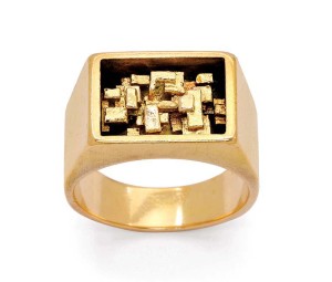 18-karat gold ring decorated with a cluster of tiny ingots by Karl Stittgen.