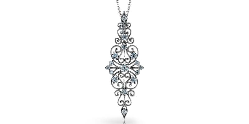 18-karat white gold pendant by Simon G, with round white diamonds (.69 ctw).