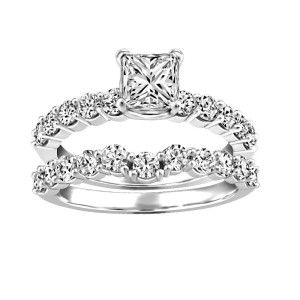 [Top] 14-karat white gold ring, with princess-cut Canadian centre diamond (1.00 ctw) and Canadian diamonds (.60 ctw) on the shank. [Bottom] 14-karat white gold band with Canadian diamonds (.66 ctw). 