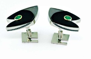 'Green Arrow' cufflinks in white gold, with black jade, meteorite, round bezel-set tsavorite garnets, and bead-set black diamonds.