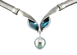 'Mood Indigo' pendant/clasp,Â with indicolite tourmalines (6.42 ctw) and one pear-shape diamond (.10 ctw) suspending a drop-shape South Sea pearl with turquoise overtone.