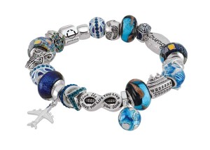 Persona sterling silver bracelet with beads and charms from the 'Wanderlust' collection, as well as some favourites in vibrant blue tones. The beads are fashioned from artisanal Italian glass and Austrian crystals, and include detailed hand-painted enamel designs.