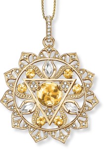 Manipura, the solar plexus chakra representing willpower, personality, and wisdom. Featuring 18-karat yellow gold, brilliant-cut and domed lense-cut yellow quartz, navette-cut milky quartz, and white diamonds.