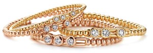 Gold and diamond stretch bracelets by Hulchi Belluni.