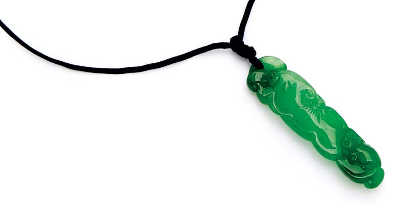 Elongated jadeite plaque pendant depicting the symbolic 'Mushroom of Immortality' motif carved as a pair of bats amidst lingzhi mushrooms. 