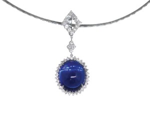 23-carat violetish-blue heated oval cabochon tanzanite set in a pendant.