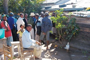 Sellers lined up waiting to see the author in Ilakaka, Madagascar.