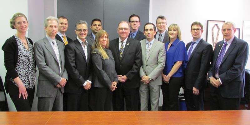 The Canadian Jewellers Association board of directors. [Left to right front row] Carmen Bokenfohr, Concept Jewelry Design; Mark Brancier, Brancier Jeweller-Gemologist Inc.; Albert Wizman, Wizman Gems Int'l Ltd.; Tanya Parrish, Canadian Gem; David Ritter, Canadian Jewellers Association; Yakup Tecimer, Tecimer Jewellery Ltd.; Kim Markwart, Markwart Jewellers; Troy Calder, Charm Jewelry Ltd.; Chris Knight, Platinum Unlimited Inc. [Left to right back row] Darren Dubrovsky, Empress; Umesh Shah, Vandan Associates Inc.; Stephen Cole, Spicer Cole Fine Jewellers Ltd.; Geoffrey Beattie, Barclay's Fine Custom Jewellers; Absent: Mo Charania, Jubilee Fine Jewellers.