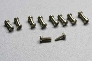 Creating these dumbbell connectors would be difficult without a watchmaker's lathe.