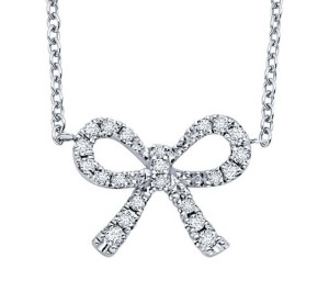 White gold and diamond bow pendant by KC Designs.