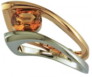 Strelau-two-tone-channel-set-ring-with-brown-topaz-and-a-laser-welded-bering-for-security