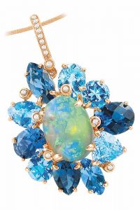 14-karat rose gold pendant featuring opal centre stone surrounded by blue topaz and diamond accents from the ‘Magnolia’ collection by Bellarri. MSRP US$4430