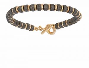 Stretch bracelet with black- and yellow-plated sterling silver beads by Double Bone, distributed by Italgem Steel.