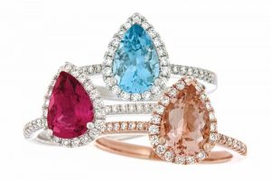 Diamond-set rings in 14-karat gold from Paragon Fine Jewellery. Two white gold rings feature 1.15-carat aquamarine and 1.32-carat pink tourmaline, respectively, while the rose gold ring is set with a 1.30-carat morganite.