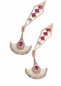 'Pendulum' earrings from the 'Precious Time' collection by K8 Jewelry Concepts Bijoux, featuring VS diamonds (0.95 ctw), princess-cut rubies, and pinkish-red spinel set in 18-karat rose and white gold.