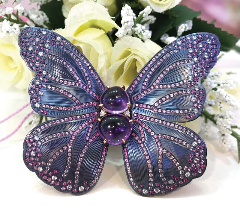 ‘Butterfly’ brooch in titanium set with amethysts, sapphires, and diamonds by Japanese designer May Jewelry.