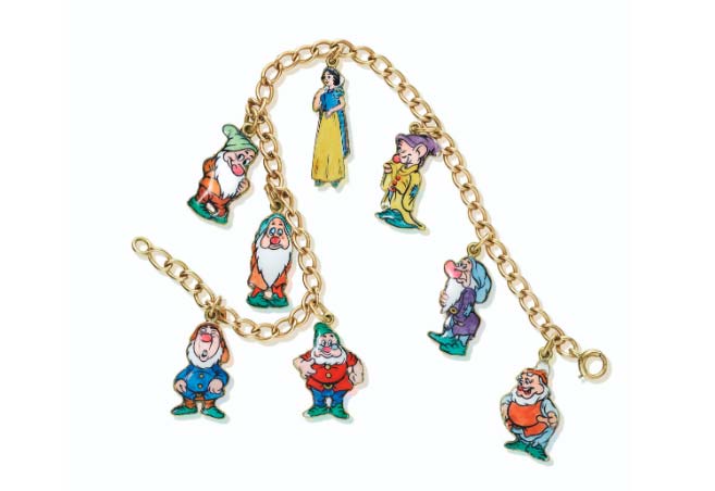 A Snow White and the Seven Dwarfs charm bracelet by Cartier sold for seven times its estimate.