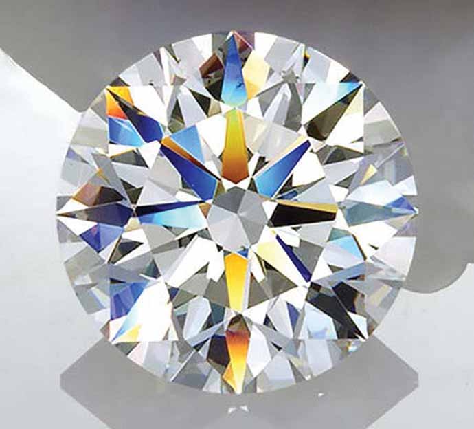 Round diamond with excellent brilliance, fire and symmetry. Photo© Michael Cowing, ACA Gem Lab