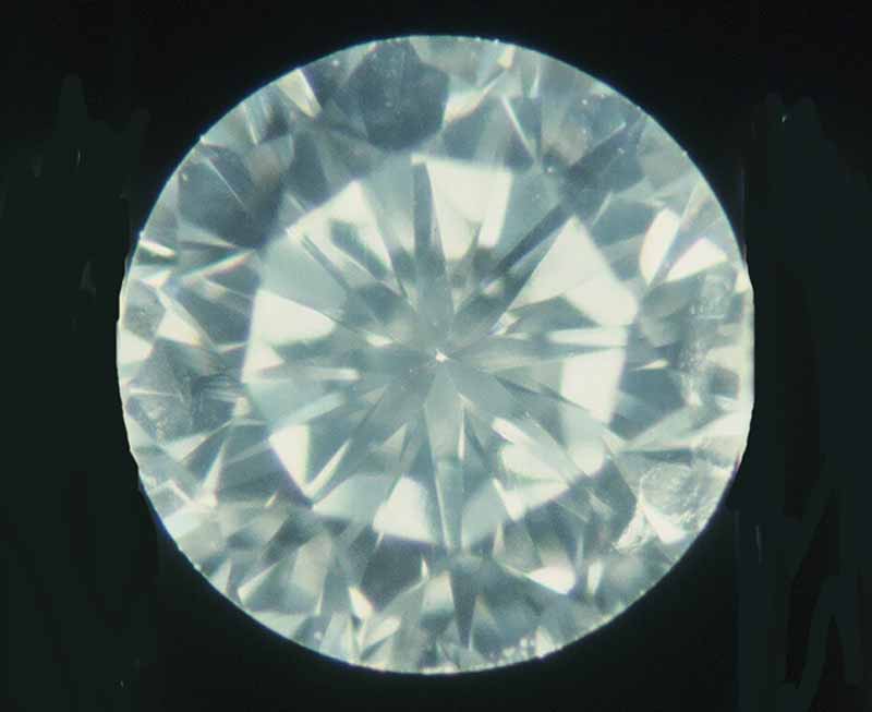 Sub-microscopic particles make this diamond look cloudy.