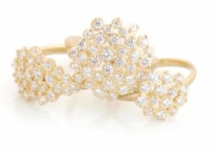 Handmade gold ‘Festival’ rings by Anne Sportun with clusters of round brilliant-cut diamonds.<br /> <span style="font-size: 10pt; font-family: arial, helvetica, sans-serif;"><i>Photo ©Anne Sportun </i></span>