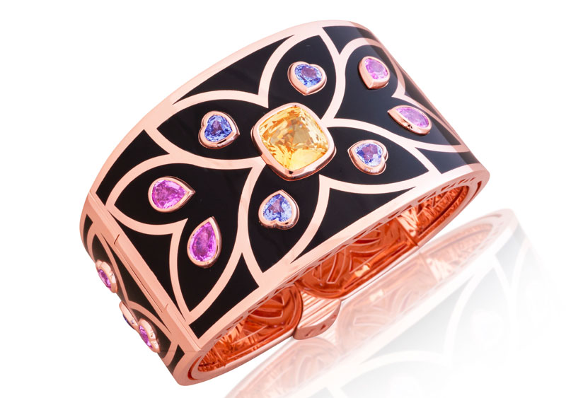 Picchiotti is among the 16 fine jewellery brands set to come together as part of Haute Jewels Geneva this spring. Pictured is an 18-karat rose gold cuff bracelet, featuring black ceramic, 8.46-carat cushion yellow sapphire centre stone, oval blue sapphires (2.87 ctw), heart-shape blue sapphires (2.41 ctw), heart-shape pink sapphires (4.24 ctw), and pear-shape pink sapphires (3.24 ctw). Photo courtesy Picchiotti