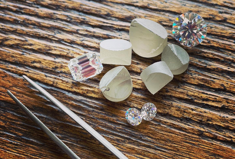 Synthetic moissanite pre-forms and faceted. Photo by Jen Hollywood of J Hollywood Designs