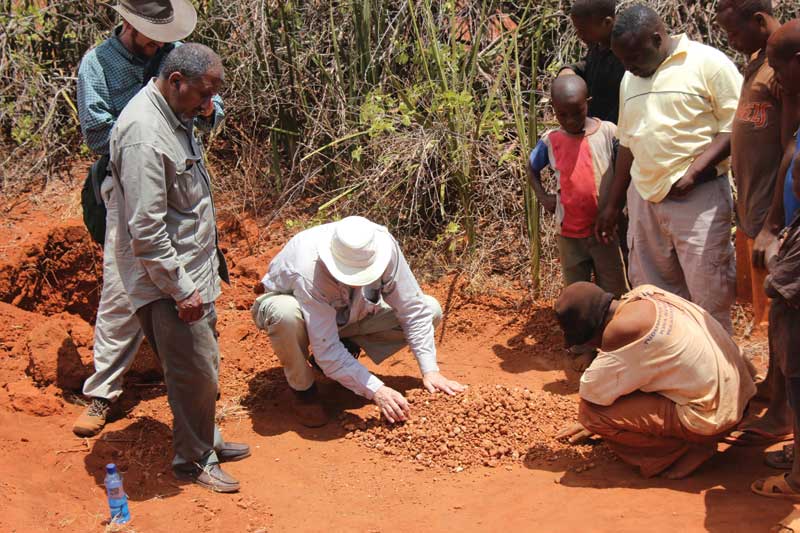 Roger Dery sorts through gravel at Happy Mother Camp in Tanga Province, Tanzania. Photo courtesy Roger Dery