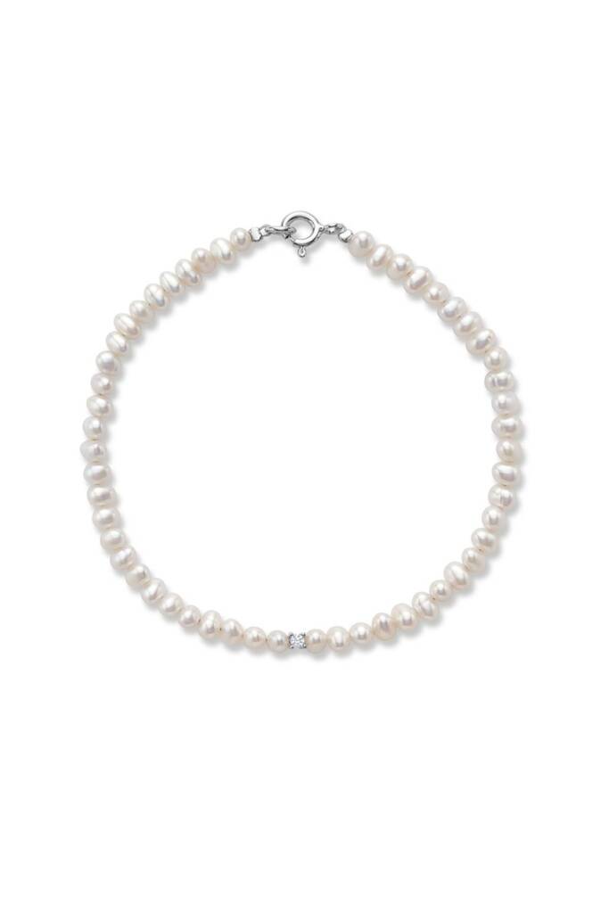 ‘Cyra’ bracelet by Nishi Pearls, featuring freshwater pearls, white topaz stone, and a rhodium-plated sterling silver clasp. Handcrafted in Montréal.  MSRP $120