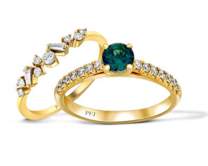 18-karat yellow gold engagement ring by Paragon Fine Jewellery, featuring a teal Montana sapphire and diamonds (0.25 ctw). Pictured with a multi-cut diamond wedding band (0.25ctw). MSRP $2,500 (engagement ring); $1,750 (band).