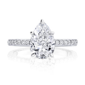 18-karat white gold ‘Eloise’ engagement ring by Jean Dousset, featuring a laboratory-grown pear shape diamond.