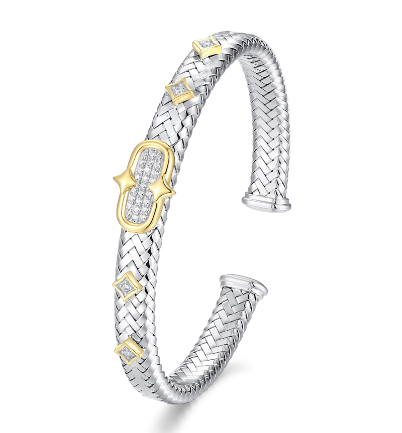 Two-tone rhodium and 23-karat gold-plated sterling silver cuff, featuring a textured band and cubic zirconia (CZ) stones from Charles Garnier’s ‘New Mesh Collection,’ courtesy Prime Art & Jewel (PAJ). MSRP $400