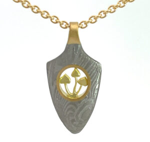 Chris Ploof unisex yanone (Japanese arrowhead) pendant in hand-forged Damascus steel with 18-karat gold and diamonds on a solid 18-karat gold chain. MSRP US$2,550 (US$1,475 without chain)