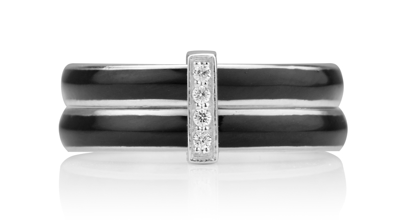 ‘Intention’ ring by MeditationRings, featuring two black enamel and sterling silver spinning bands with a silver and cubic zirconia (CZ) accent bar. MSRP $239